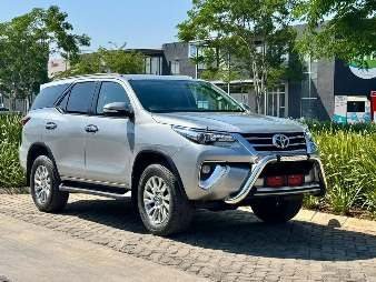 Original phone photo of a silver Toyota Fortuner
